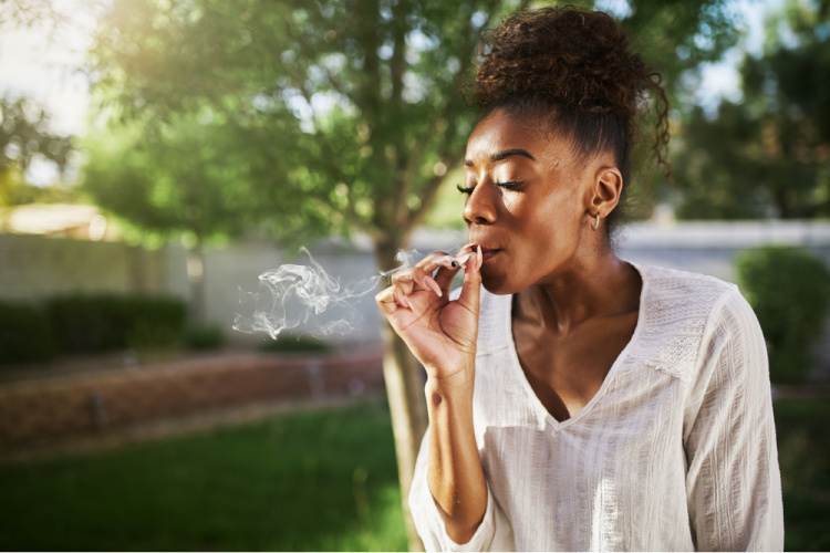 how to smoke marijuana woman with joint